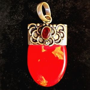 Splendid, Vivid Red, Ethnic-Style Pendant. It Has Splashes Of Yellow.